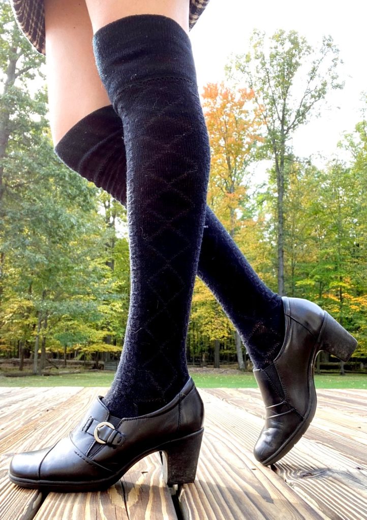 Black boots and long socks